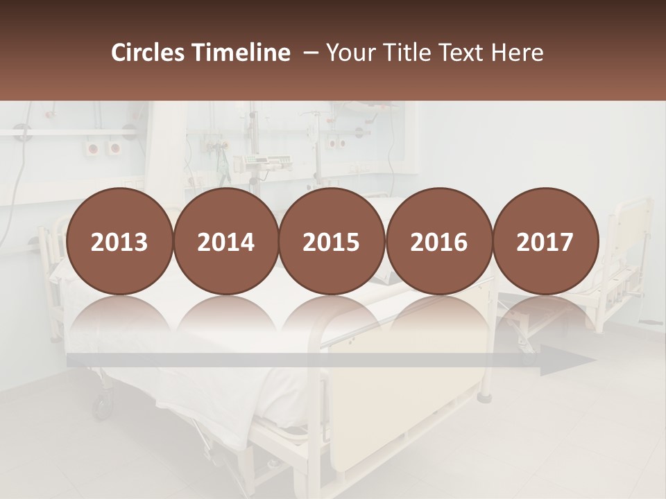 A Hospital Room With Two Beds And A Monitor PowerPoint Template