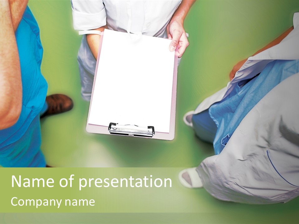 A Group Of People Standing Around A Binder PowerPoint Template