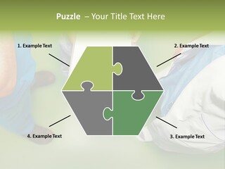 A Group Of People Standing Around A Binder PowerPoint Template