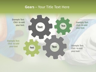 A Group Of People Standing Around A Binder PowerPoint Template