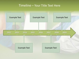 A Group Of People Standing Around A Binder PowerPoint Template