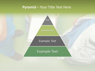 A Group Of People Standing Around A Binder PowerPoint Template