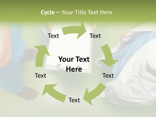 A Group Of People Standing Around A Binder PowerPoint Template