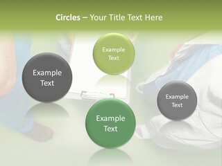 A Group Of People Standing Around A Binder PowerPoint Template