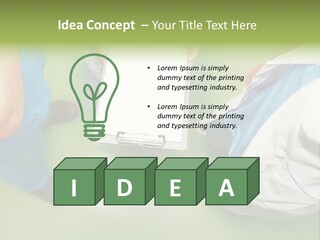 A Group Of People Standing Around A Binder PowerPoint Template