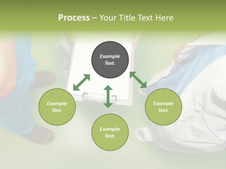 A Group Of People Standing Around A Binder PowerPoint Template