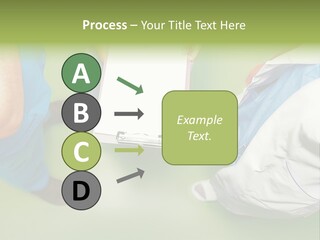 A Group Of People Standing Around A Binder PowerPoint Template