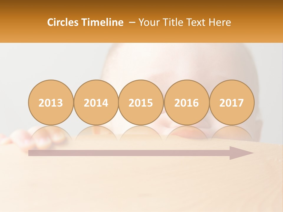 A Baby Is Peeking Over A Wooden Table PowerPoint Template