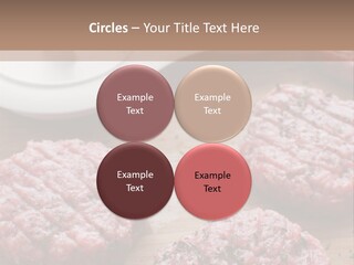 Hamburger Patties On A Cutting Board With A Knife PowerPoint Template