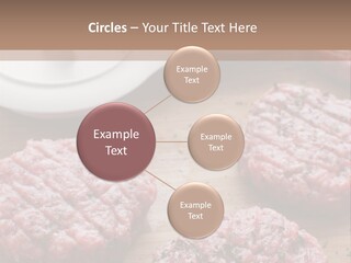 Hamburger Patties On A Cutting Board With A Knife PowerPoint Template