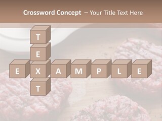 Hamburger Patties On A Cutting Board With A Knife PowerPoint Template