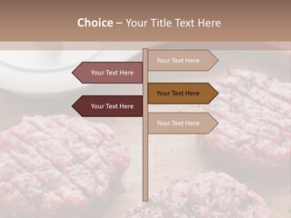 Hamburger Patties On A Cutting Board With A Knife PowerPoint Template