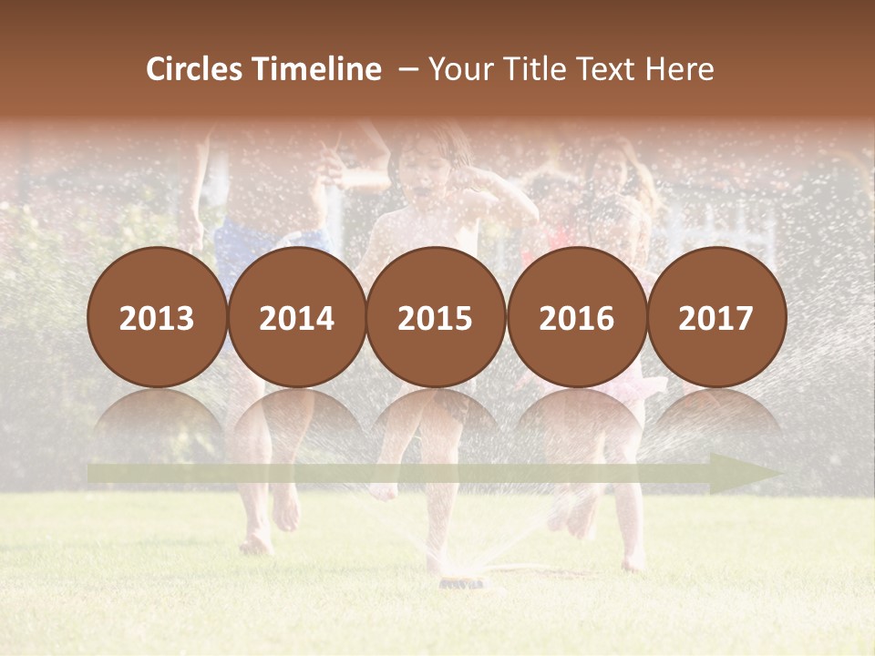 A Group Of Kids Playing In A Sprinkle Of Water PowerPoint Template