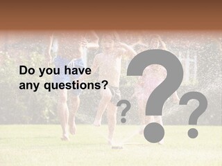 A Group Of Kids Playing In A Sprinkle Of Water PowerPoint Template