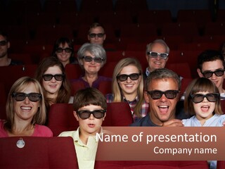 A Group Of People Sitting In A Movie Theater PowerPoint Template