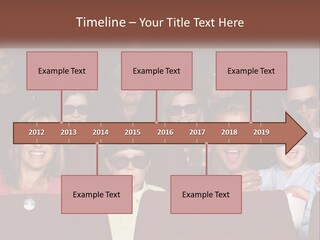 A Group Of People Sitting In A Movie Theater PowerPoint Template