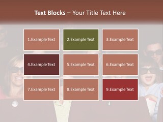 A Group Of People Sitting In A Movie Theater PowerPoint Template