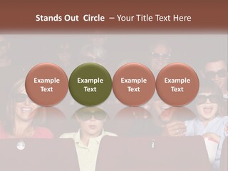 A Group Of People Sitting In A Movie Theater PowerPoint Template
