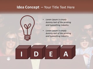 A Group Of People Sitting In A Movie Theater PowerPoint Template