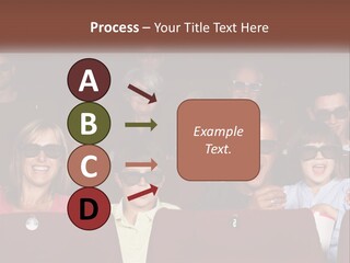 A Group Of People Sitting In A Movie Theater PowerPoint Template
