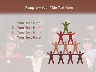 A Group Of People Sitting In A Movie Theater PowerPoint Template