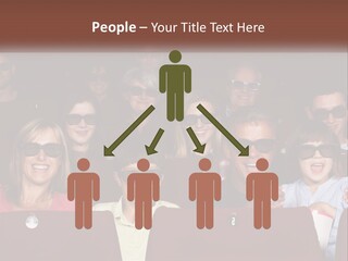 A Group Of People Sitting In A Movie Theater PowerPoint Template