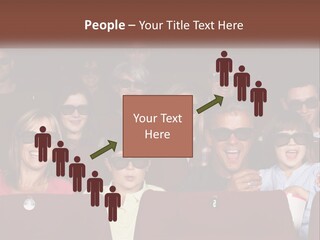A Group Of People Sitting In A Movie Theater PowerPoint Template