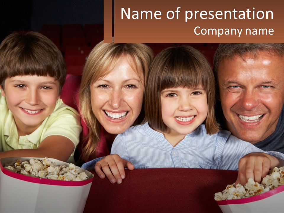 A Family Is Watching A Movie In A Theater PowerPoint Template