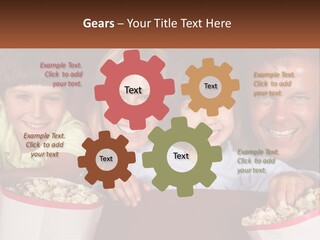 A Family Is Watching A Movie In A Theater PowerPoint Template