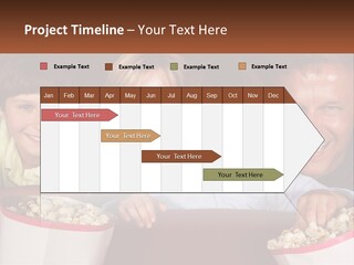 A Family Is Watching A Movie In A Theater PowerPoint Template