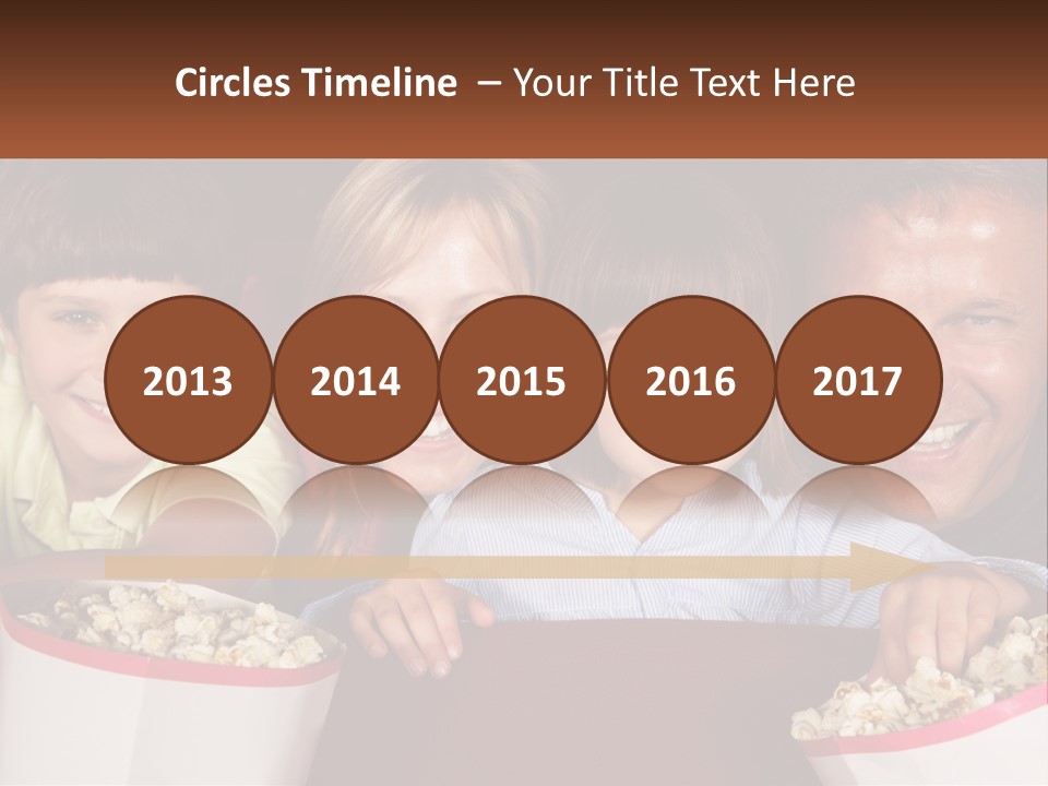 A Family Is Watching A Movie In A Theater PowerPoint Template
