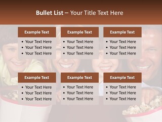 A Family Is Watching A Movie In A Theater PowerPoint Template