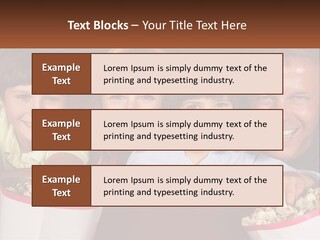 A Family Is Watching A Movie In A Theater PowerPoint Template