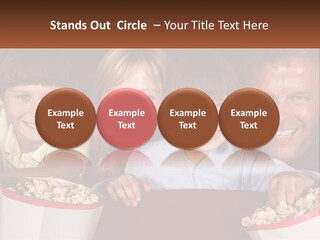 A Family Is Watching A Movie In A Theater PowerPoint Template