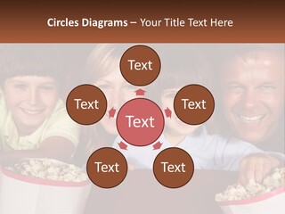 A Family Is Watching A Movie In A Theater PowerPoint Template