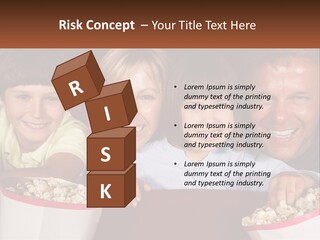 A Family Is Watching A Movie In A Theater PowerPoint Template
