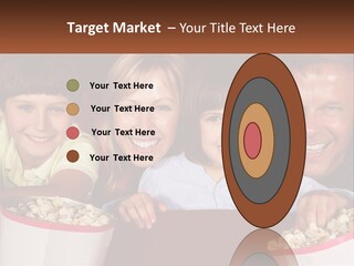 A Family Is Watching A Movie In A Theater PowerPoint Template
