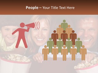A Family Is Watching A Movie In A Theater PowerPoint Template