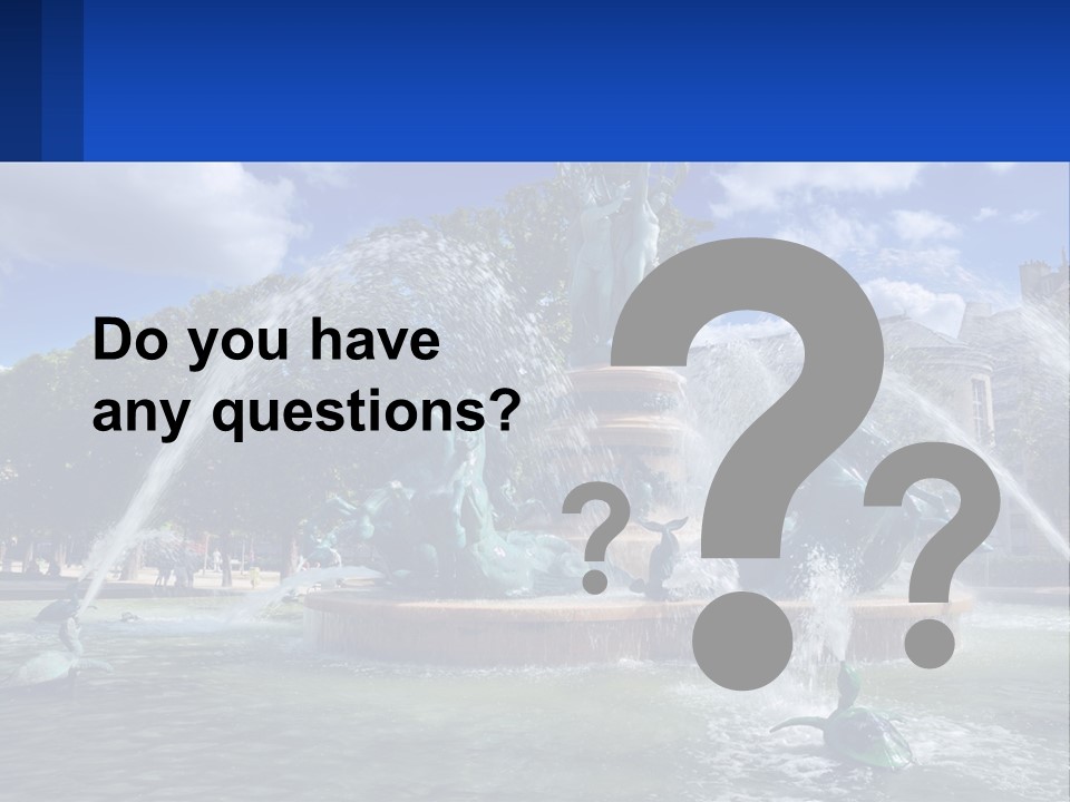 A Fountain With A Statue In The Middle Of It PowerPoint Template