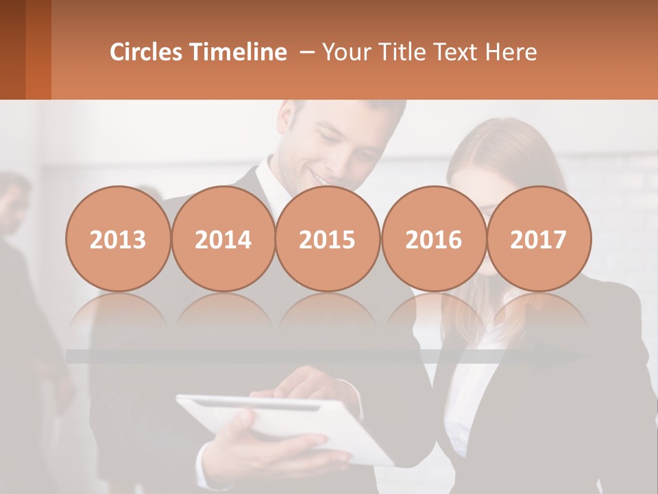 A Man And A Woman Looking At Something On A Table PowerPoint Template