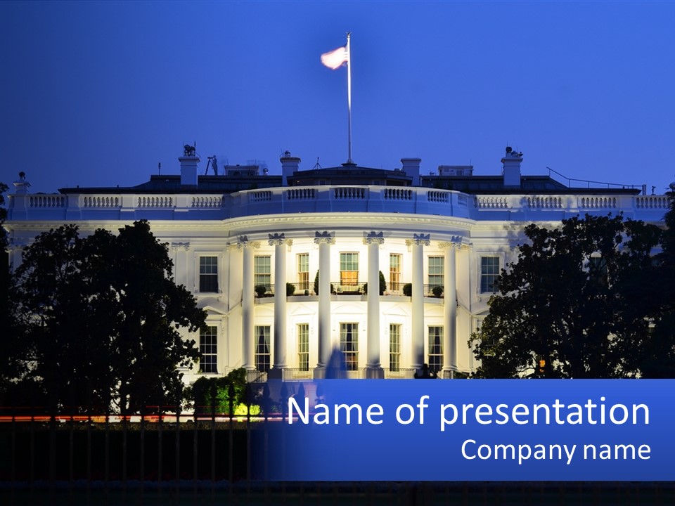 A Picture Of The White House At Night PowerPoint Template