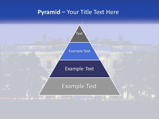 A Picture Of The White House At Night PowerPoint Template