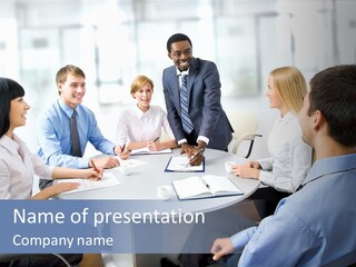 A Group Of Business People Sitting Around A Table PowerPoint Template