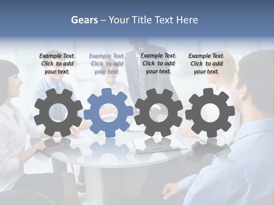 A Group Of Business People Sitting Around A Table PowerPoint Template