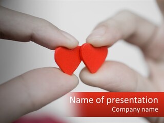 A Couple Of Hands Holding A Red Heart PowerPoint Template