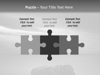 A Black And White Photo Of A Rock In The Ocean PowerPoint Template
