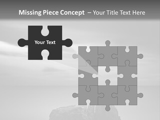 A Black And White Photo Of A Rock In The Ocean PowerPoint Template