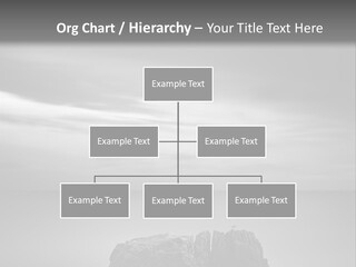 A Black And White Photo Of A Rock In The Ocean PowerPoint Template