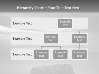 A Black And White Photo Of A Rock In The Ocean PowerPoint Template