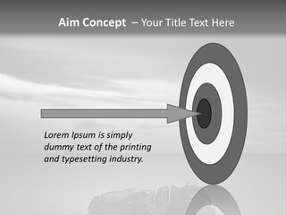 A Black And White Photo Of A Rock In The Ocean PowerPoint Template